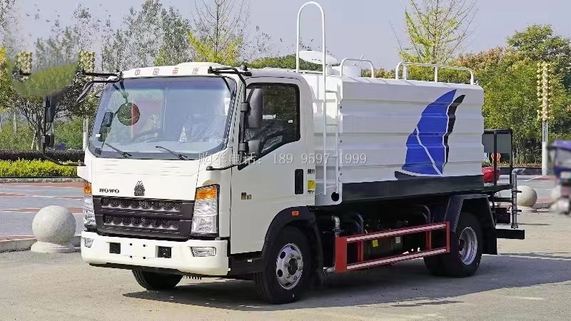 新款蓝牌7方重汽‬豪沃轻卡抑尘洒水车厂家